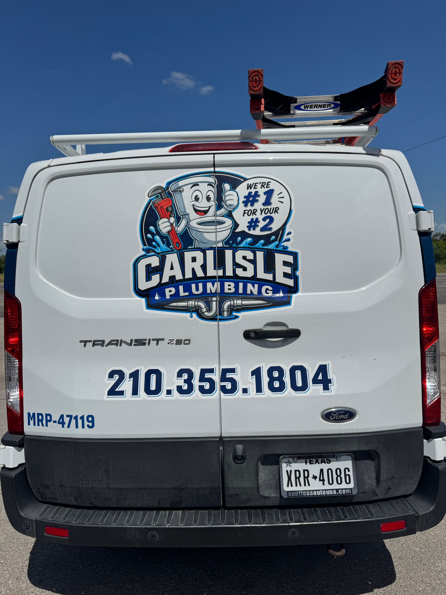 Carlisle Plumbing van rear with phone 210.355.1804